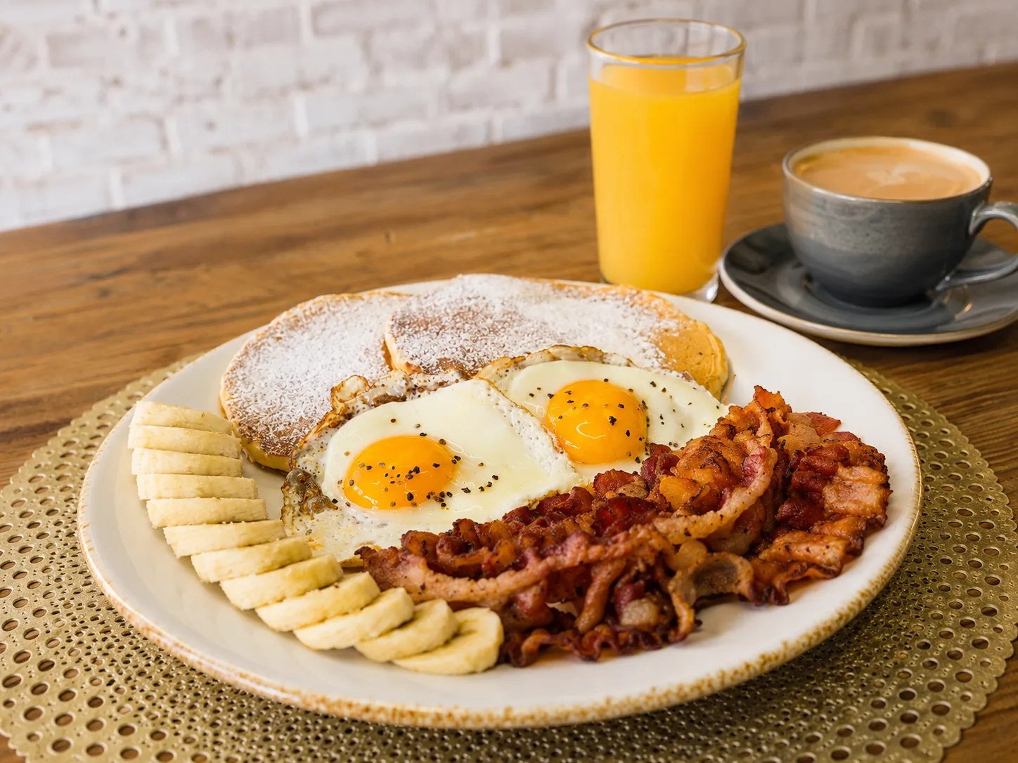 Gringo Breakfast combo with eggs bacon and pancakes at Celtic Cactus Playa del Carmen