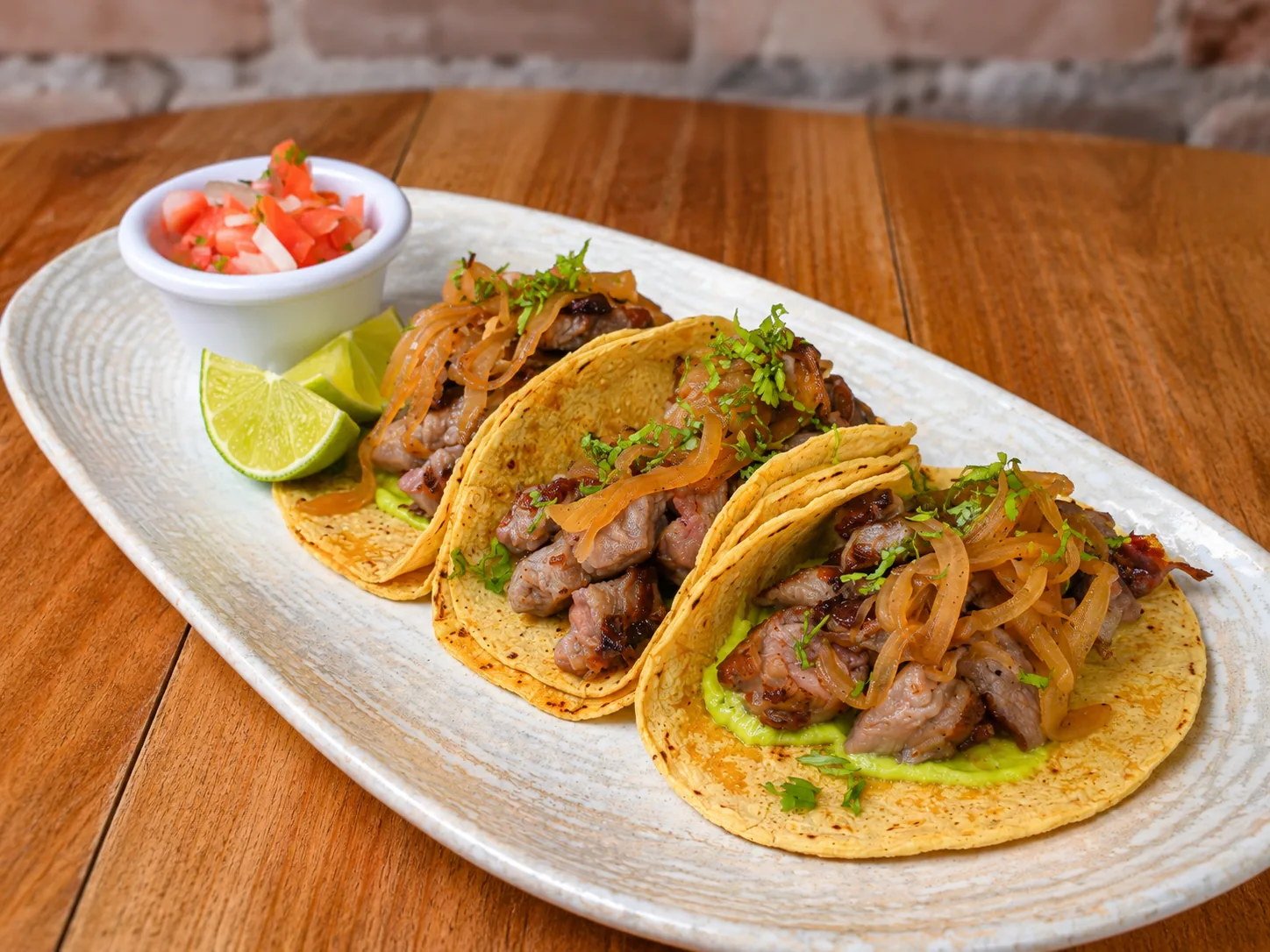 Tacos with pico de gallo and lime at Celtic Cactus Playa del Carmen